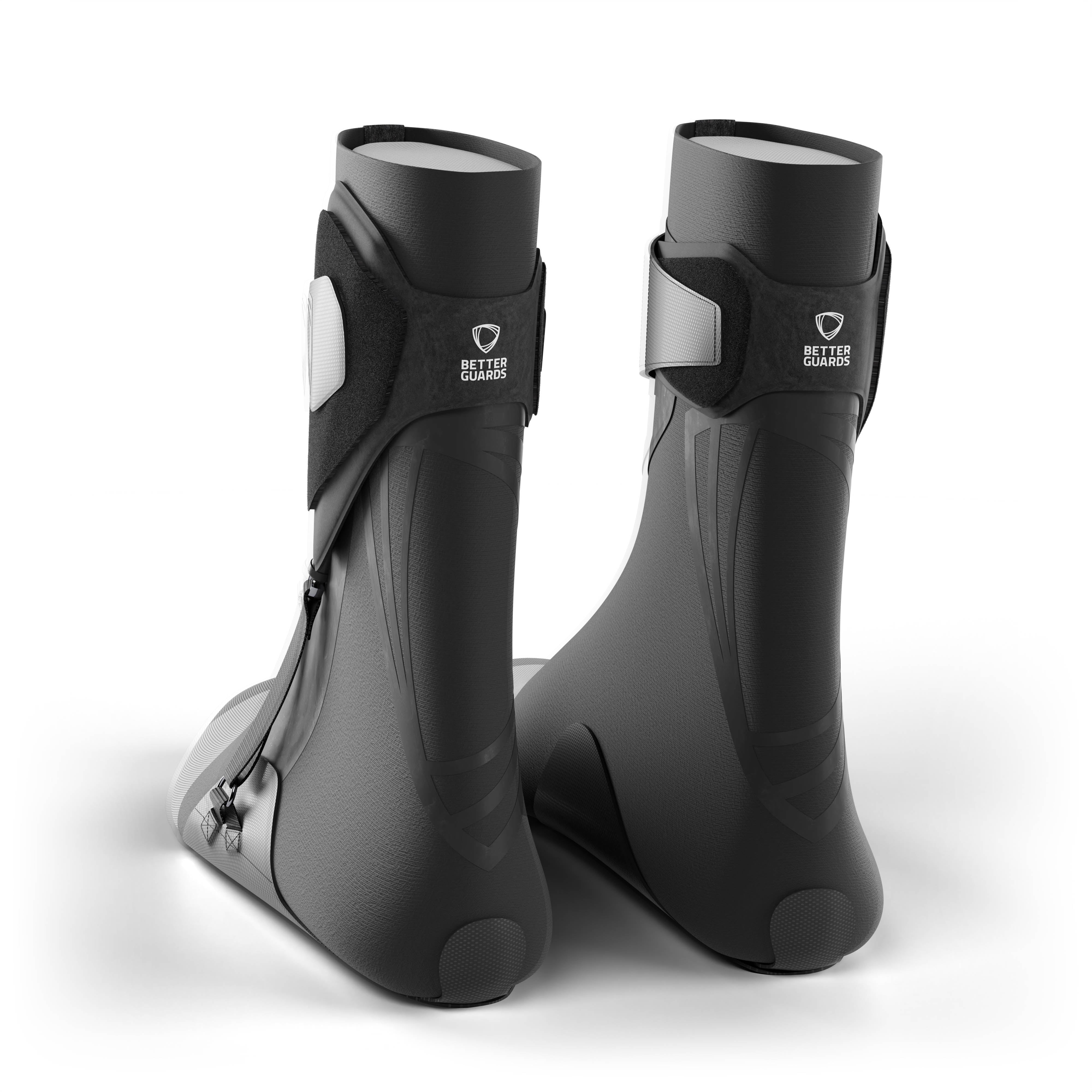Pair of black ankle support braces. Back view