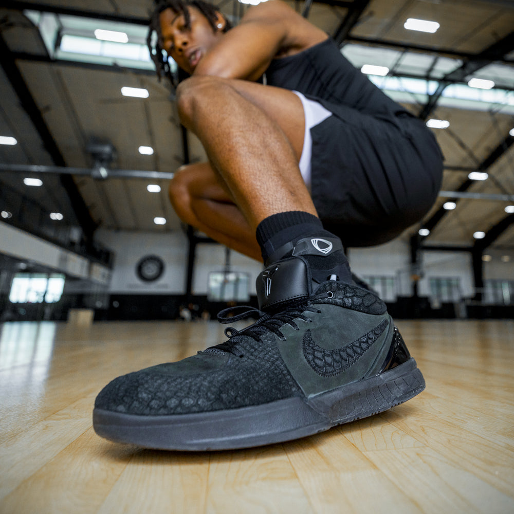 Black ankle brace for maximum protection to prevent ankle sprains